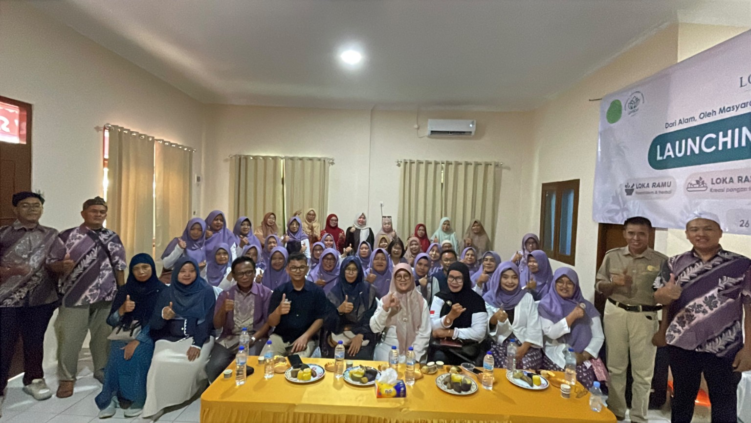 Foto bersama launching LOKA BUMI bersama masyarakat dan UMKM Asri 27